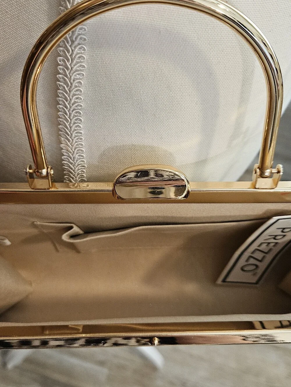 Prezzo Embellished Gold Clutch